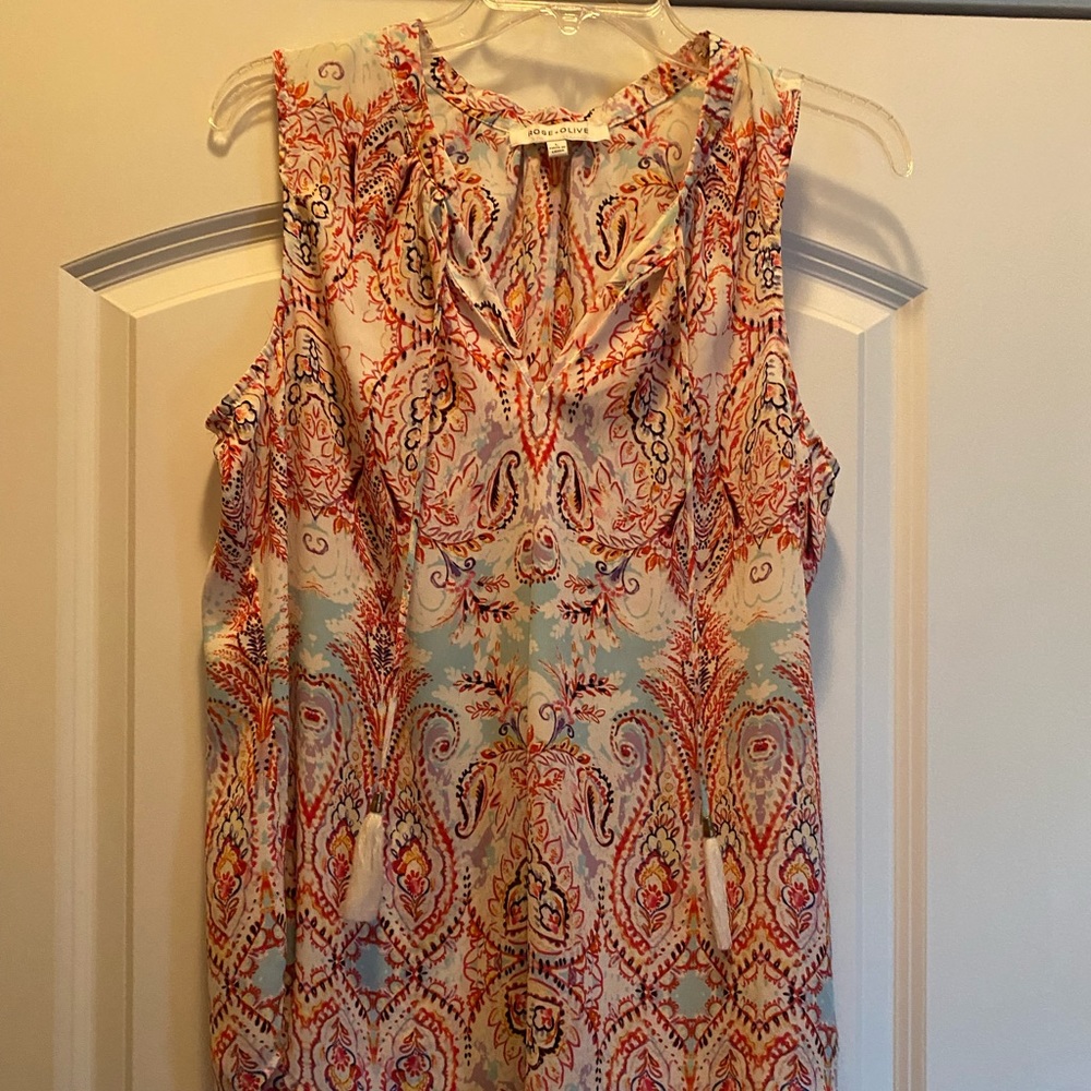 Sleeveless “silky” blouse